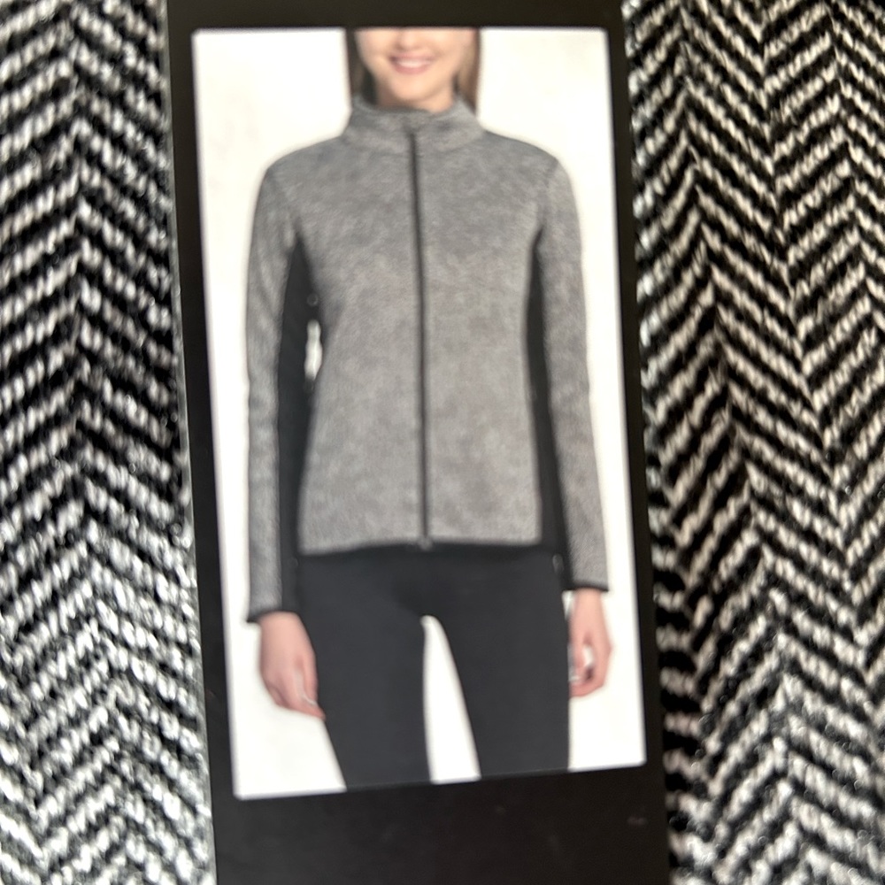 NWT Jacket size XXL fits 14 and up. Flattering style and design